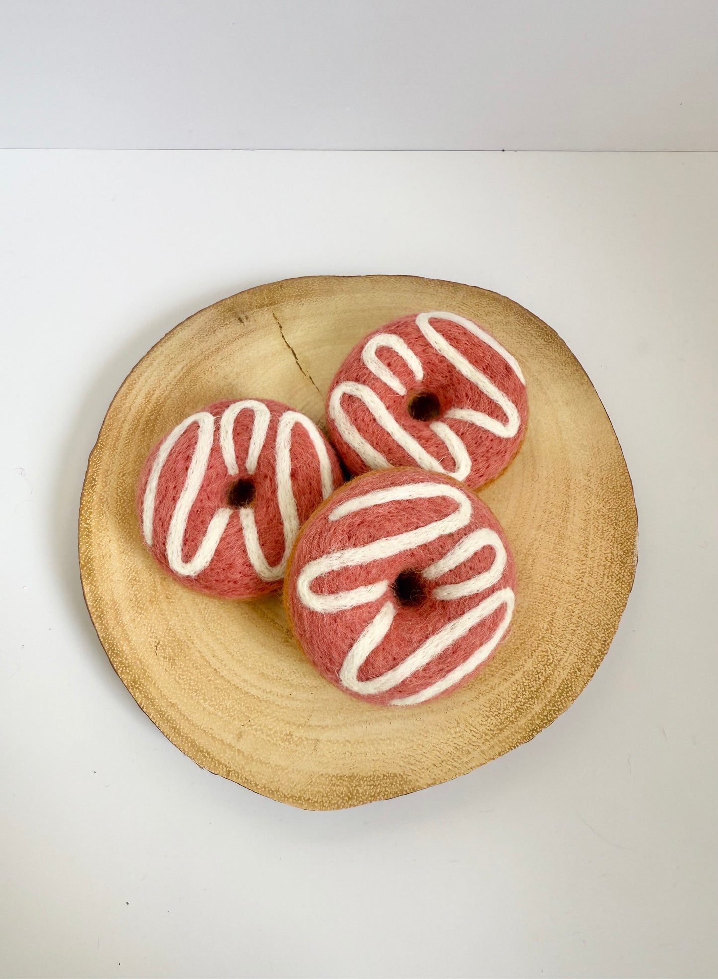 Felt pink icing donut