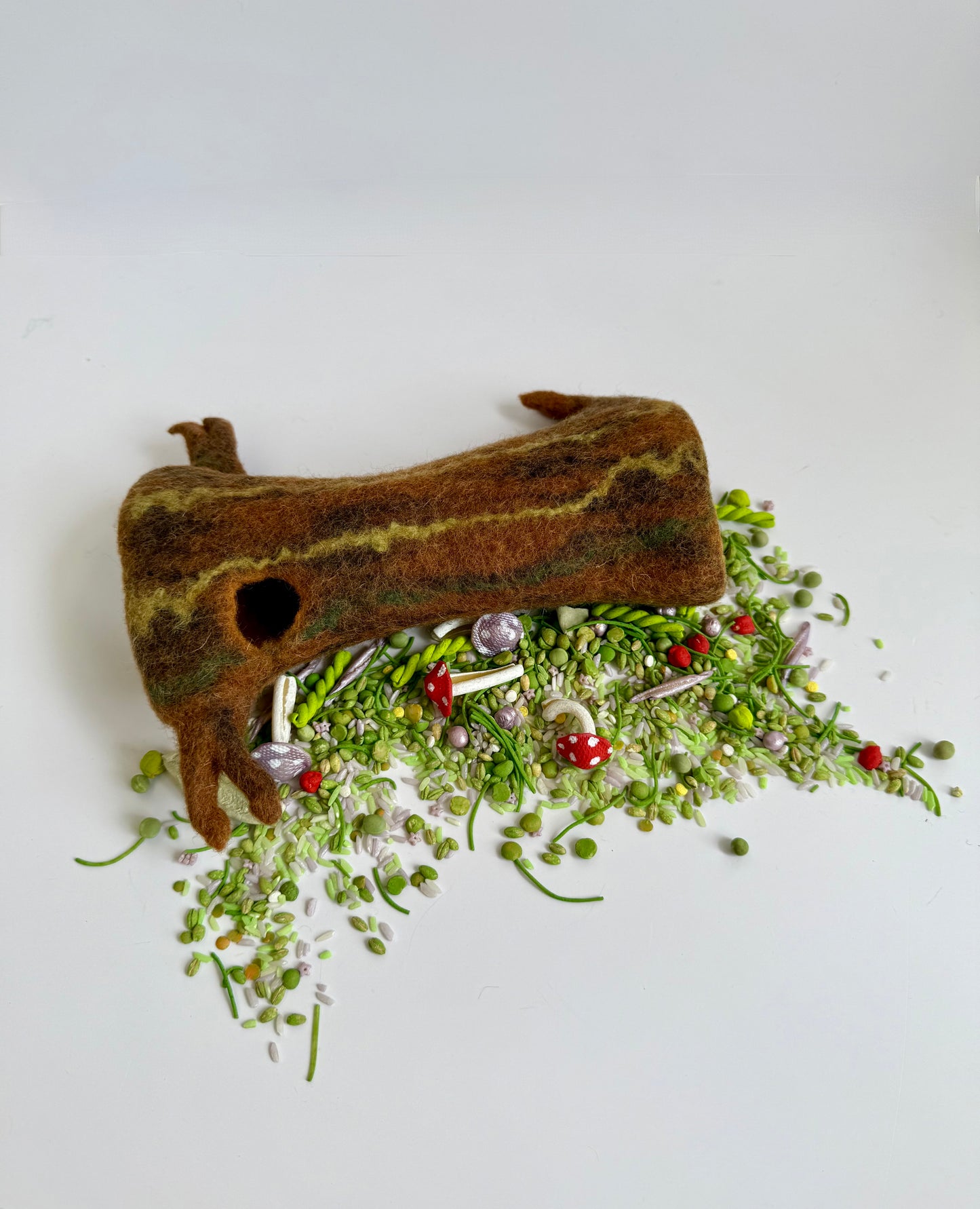 Hand felted tree log