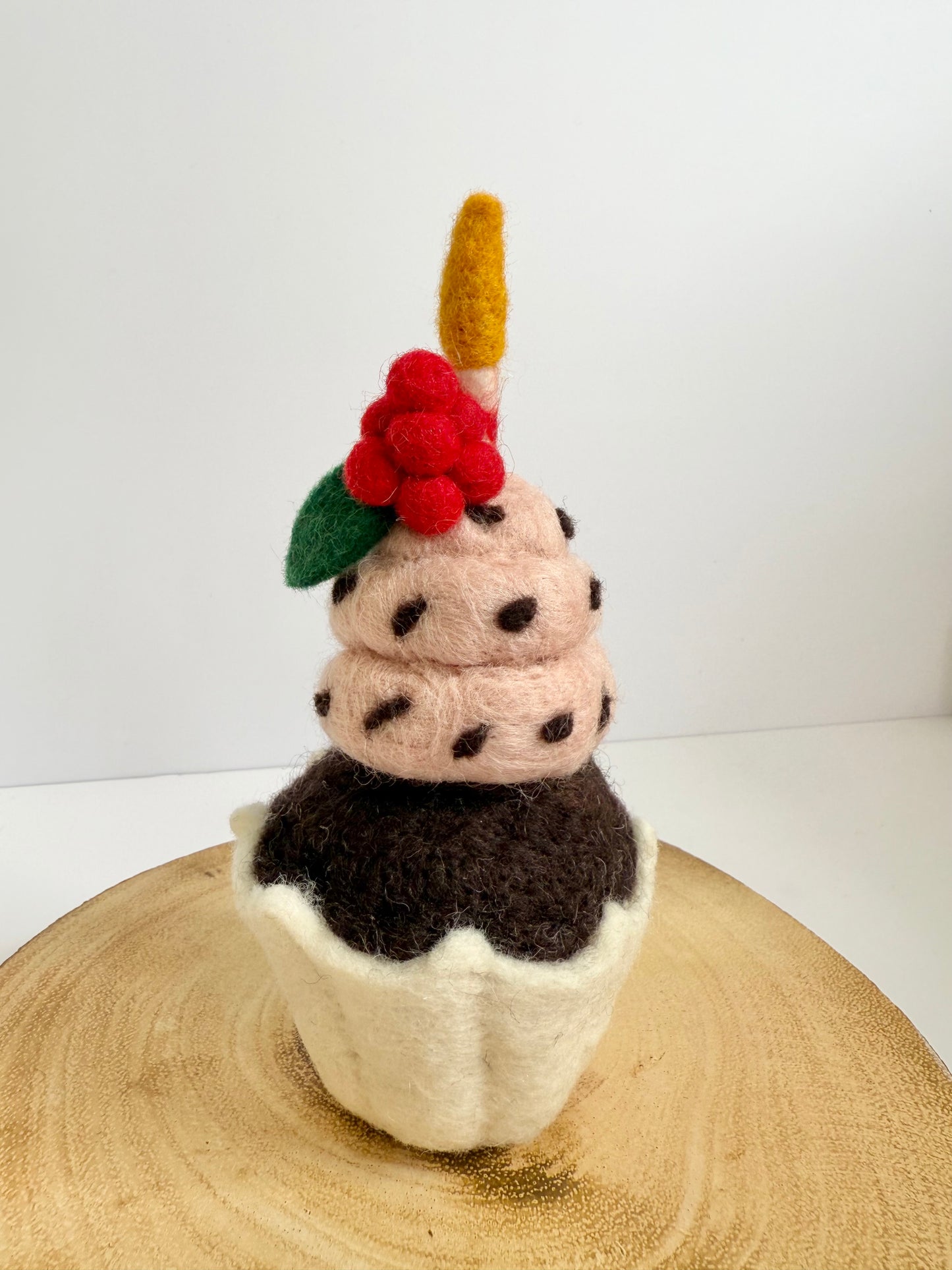 Raspberry birthday cupcake