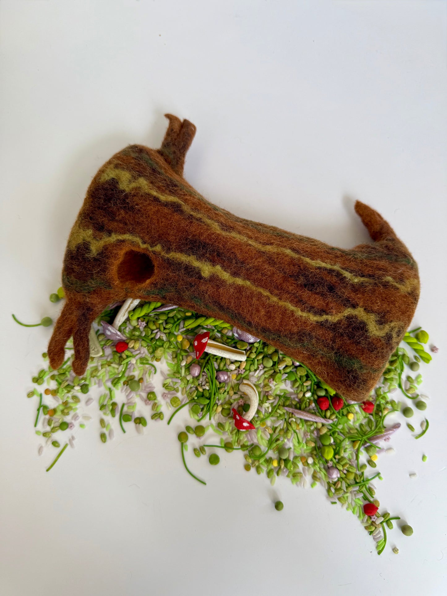 Hand felted tree log
