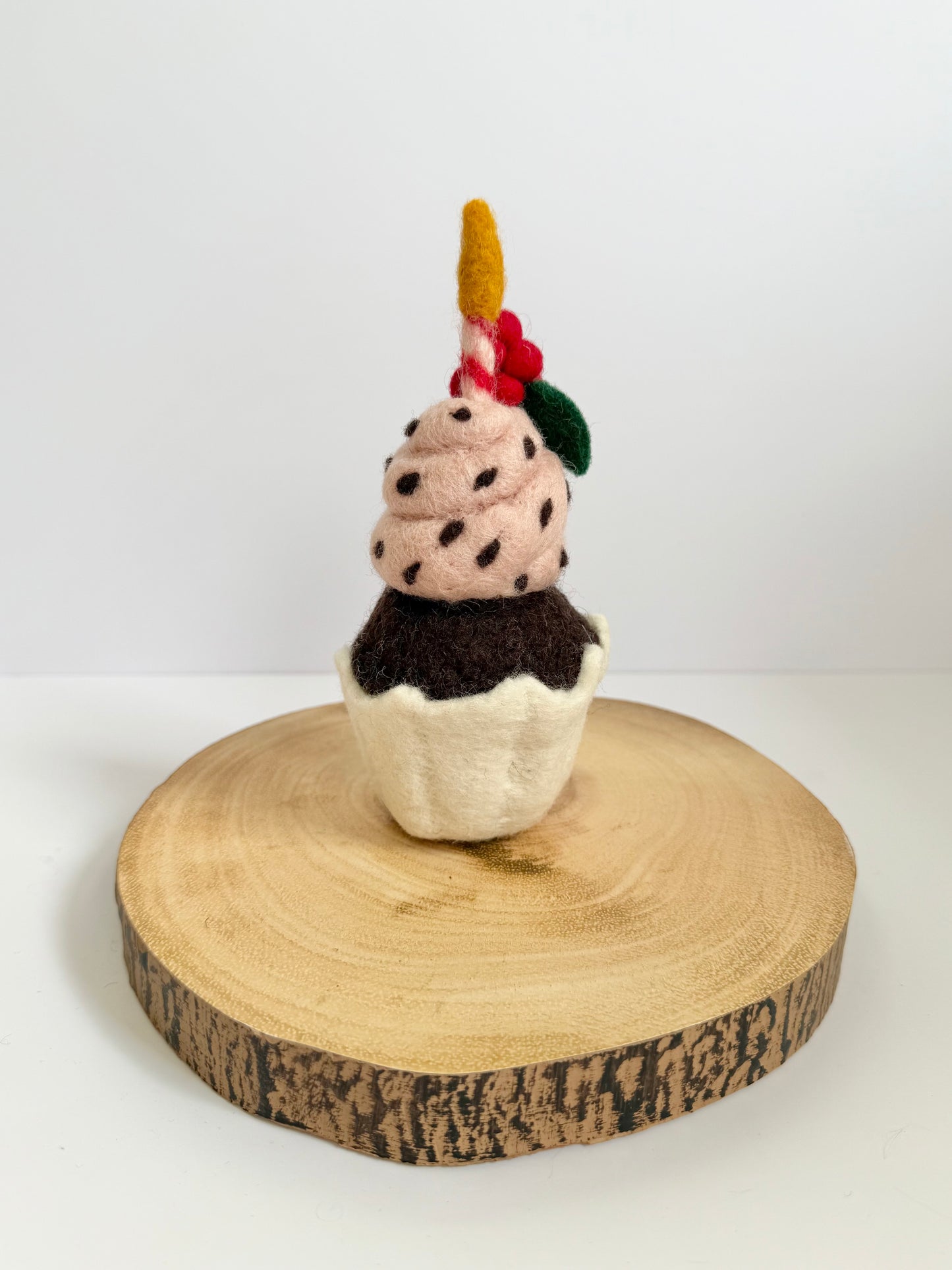 Raspberry birthday cupcake