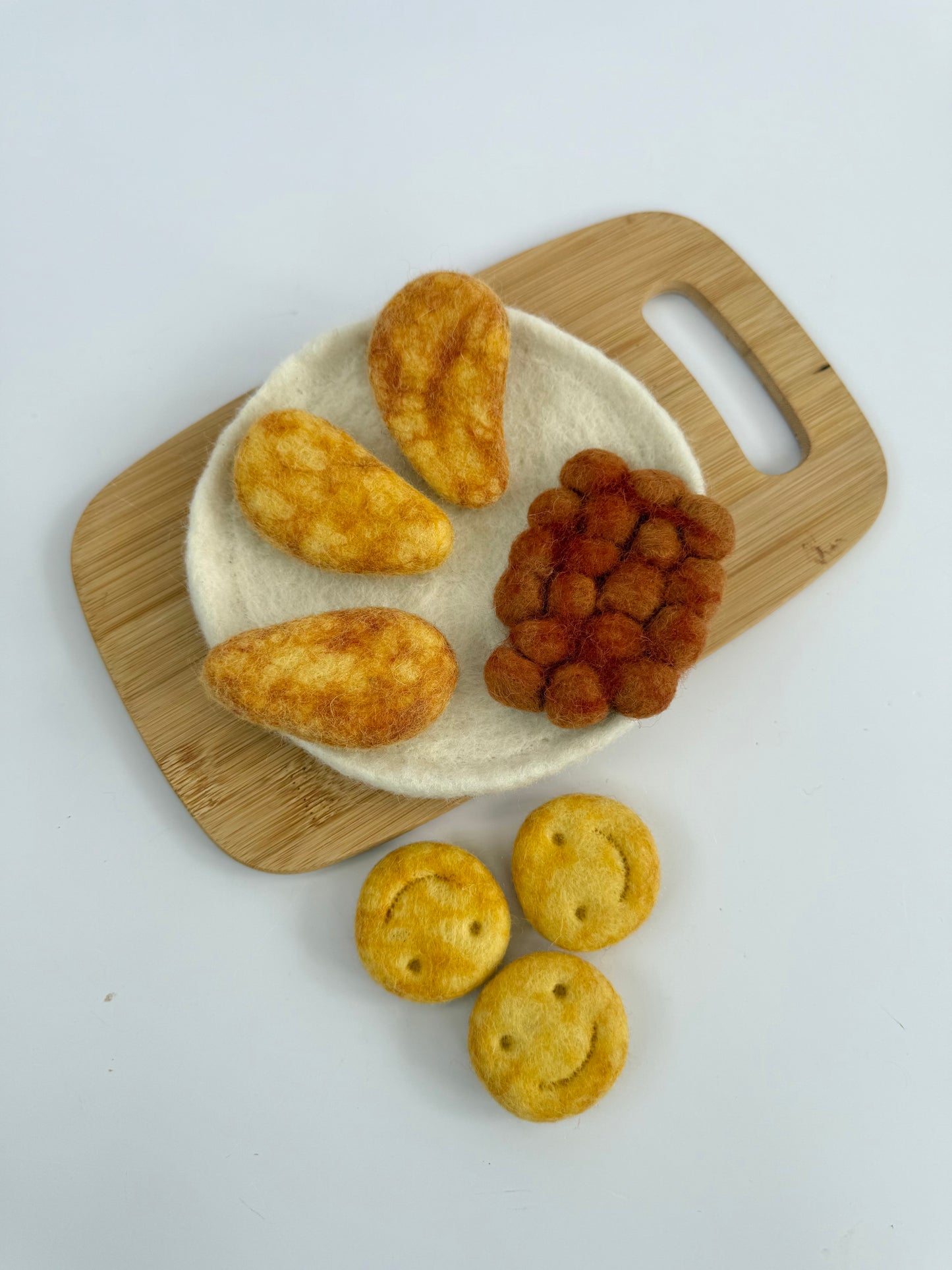 Felt chicken dippers and smiley faces play food set