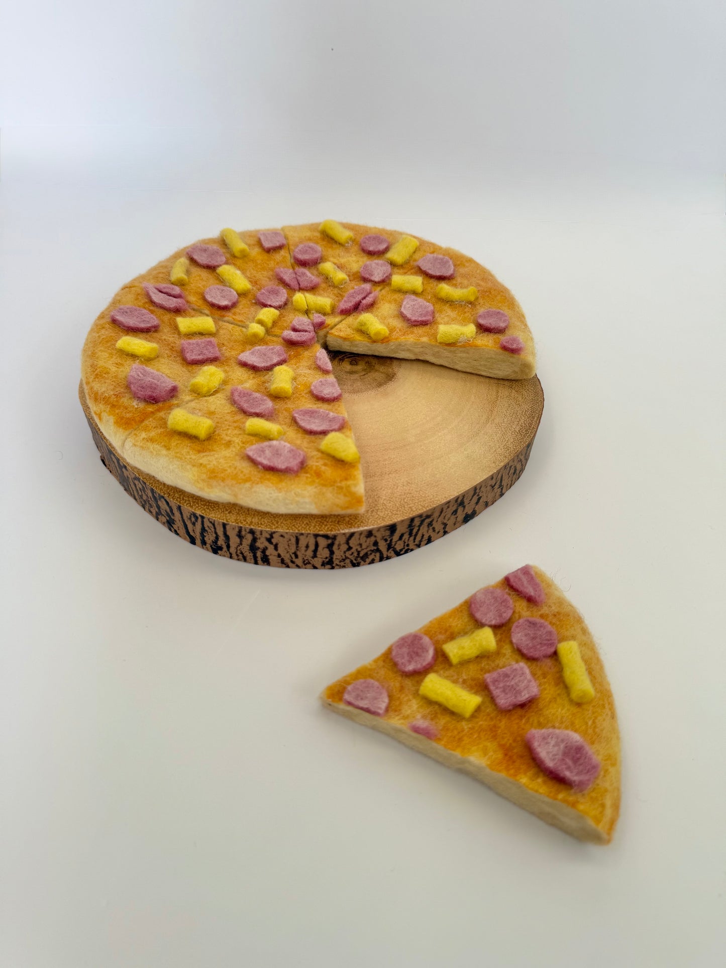 Felt ham and pineapple pizza