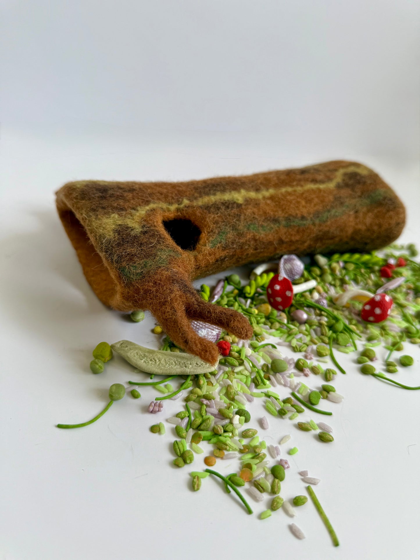 Hand felted tree log