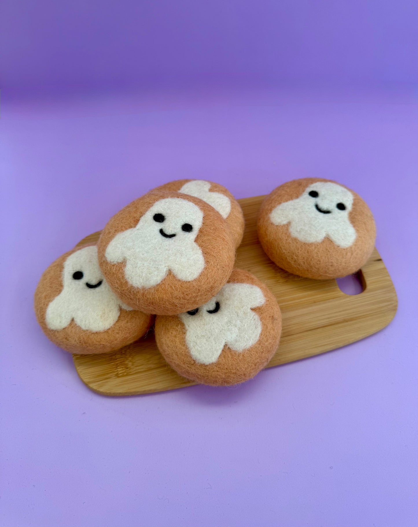 Spooky felt donuts