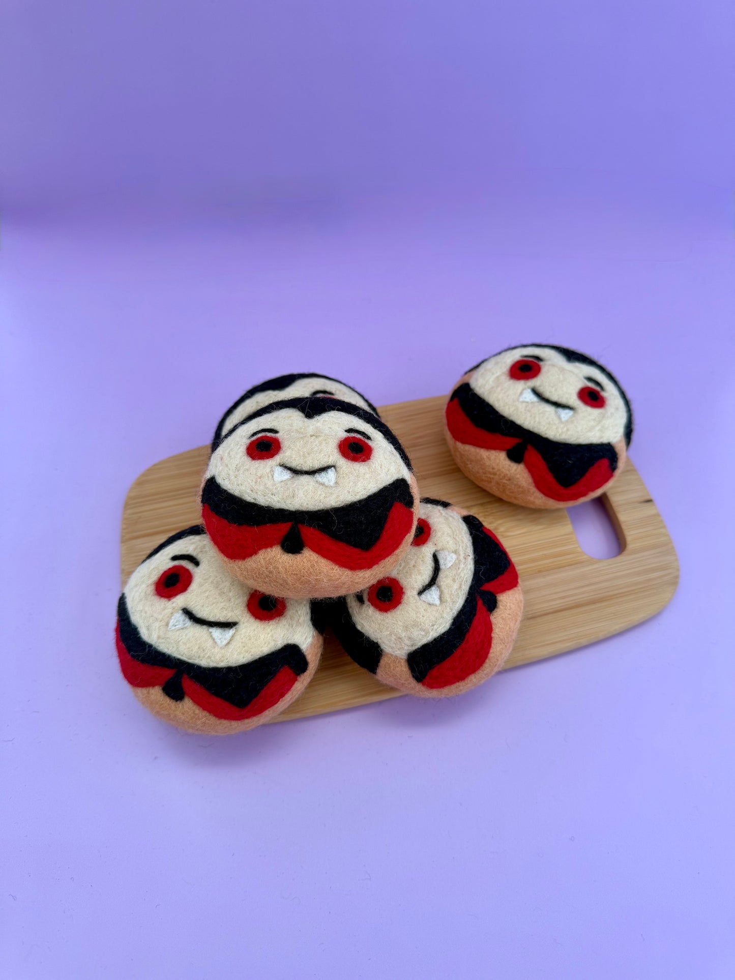 Spooky felt donuts