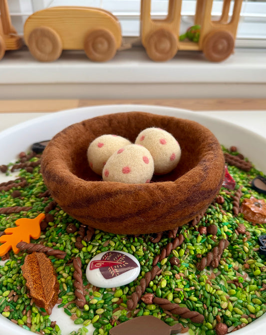 Felt birds nest with eggs