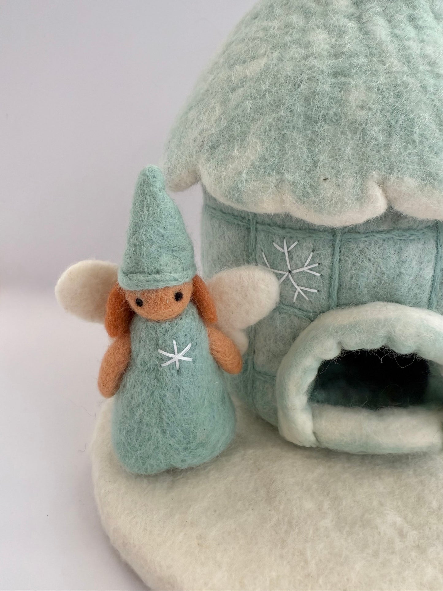 Felt winter fairy house