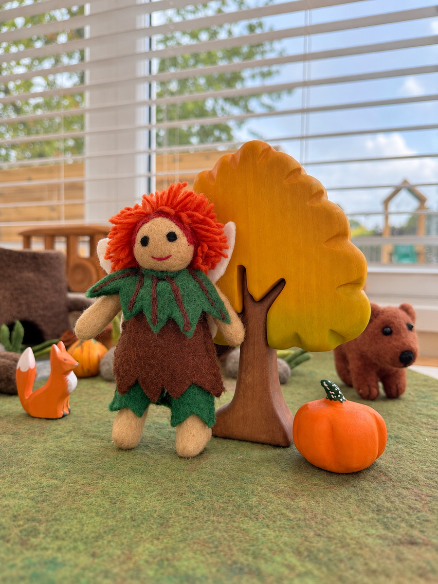 Felt red haired autumn fairy