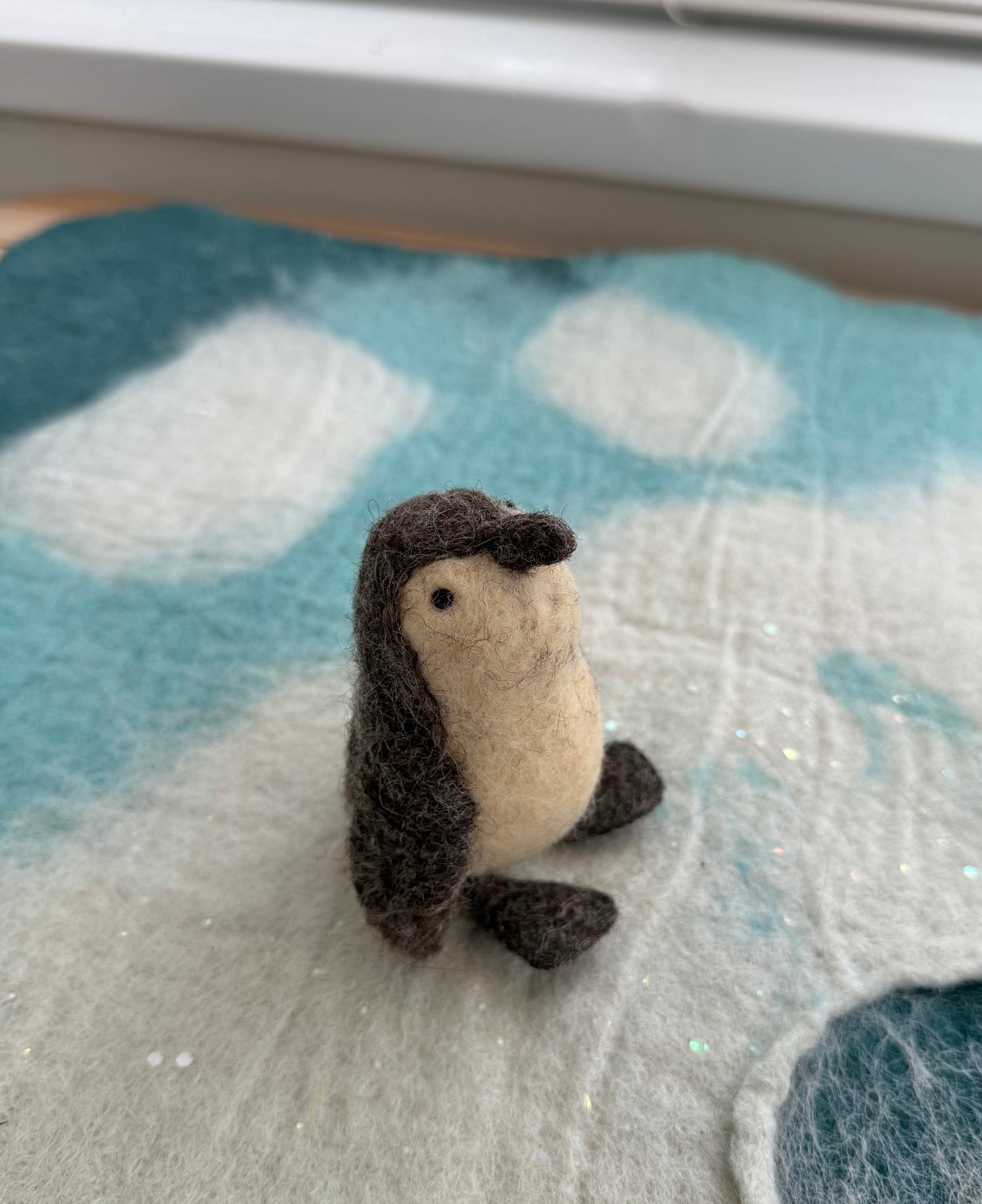 Felt penguin chick