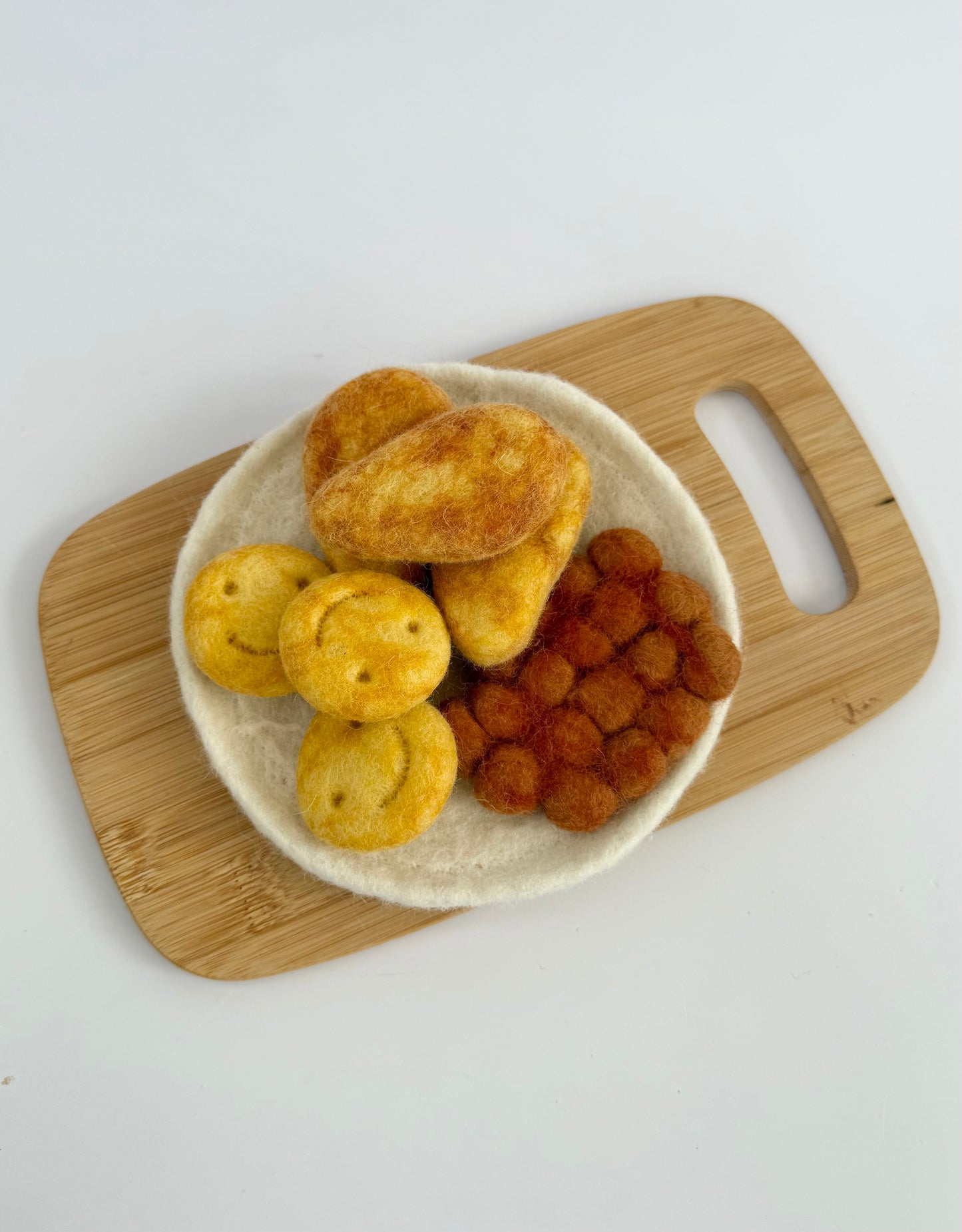 Felt chicken dippers and smiley faces play food set
