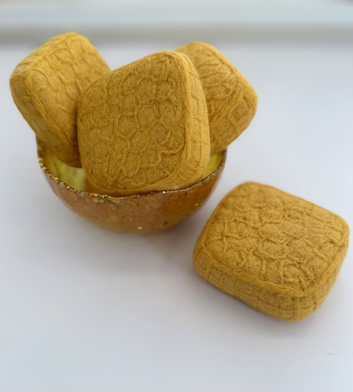 Felt slice of honeycomb